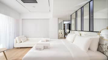 Suite de lujo | 1 dormitorio, minibar, caja fuerte y cortinas opacas