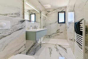Hair dryer, towels, soap, shampoo