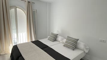 3 dormitorios, tabla de planchar con plancha, wifi gratis y ropa de cama