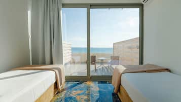 Superior Family Room Sliding Door Sea View | In-room safe, laptop workspace, soundproofing, bed sheets
