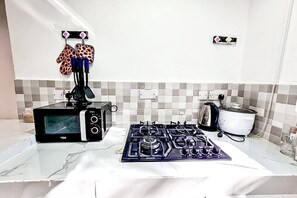 Fridge, microwave - Spacious home 1BR with livingroom ,kitchen, Wi-Fi. (Dar es Salaam)