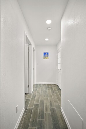 Interior - This spacious home has all you need with 2 primary suites, 2 guest bedrooms, and 3 bathrooms. There is no shortage of living space with a living room, 2 dining rooms, open floor plan w/fully-stocked kitchen, and onsite laundry. (El Paso)