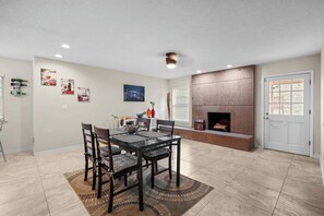 Dining - This spacious home has all you need with 2 primary suites, 2 guest bedrooms, and 3 bathrooms. There is no shortage of living space with a living room, 2 dining rooms, open floor plan w/fully-stocked kitchen, and onsite laundry. (El Paso)
