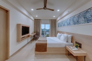 Minibar, in-room safe, desk, laptop workspace - The Fern Habitat Goa, Candolim, Series by Marriott (Candolim)