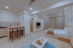 Minibar, in-room safe, desk, laptop workspace - The Fern Habitat Goa, Candolim, Series by Marriott (Candolim)