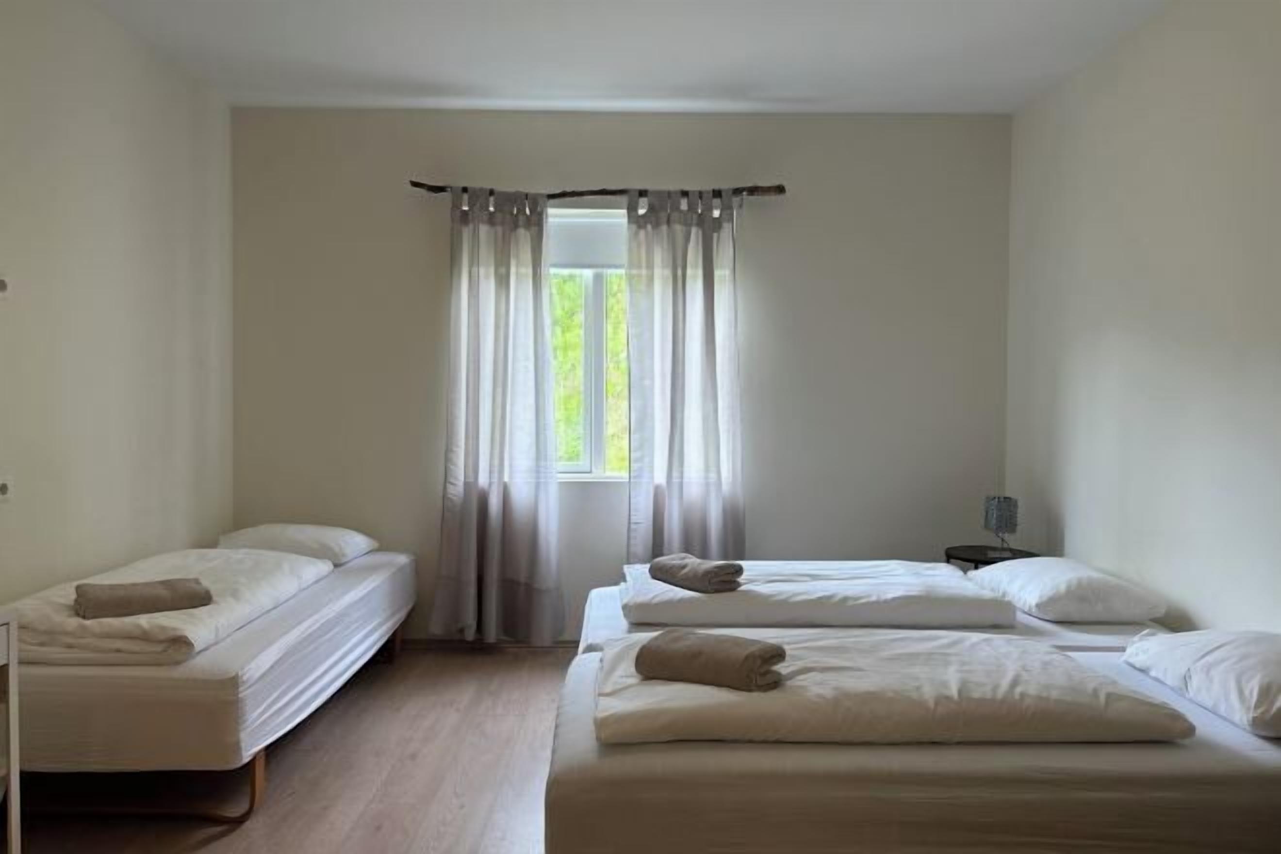 Desk, laptop workspace, free WiFi, bed sheets