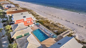 A beachfront hotel with a swimming pool, beach access, and ocean views. - Carillon Beach Inn 307, Pet Friendly!, 1BD/1BA , Beautiful Resort! (Panama City Beach)