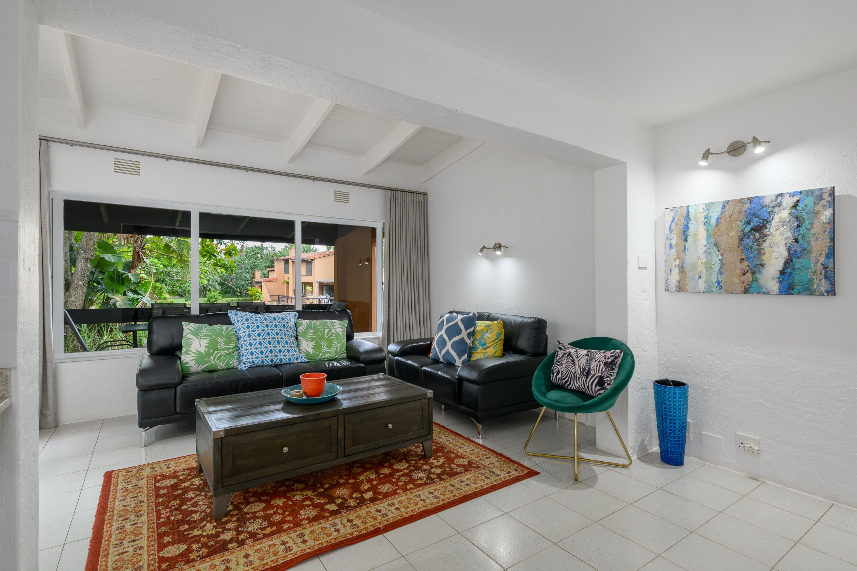 Classic Villa | Living area | 50-inch flat-screen TV with satellite channels, table tennis