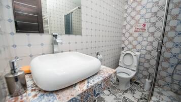Villa familiar | Baño | Regadera y toallas