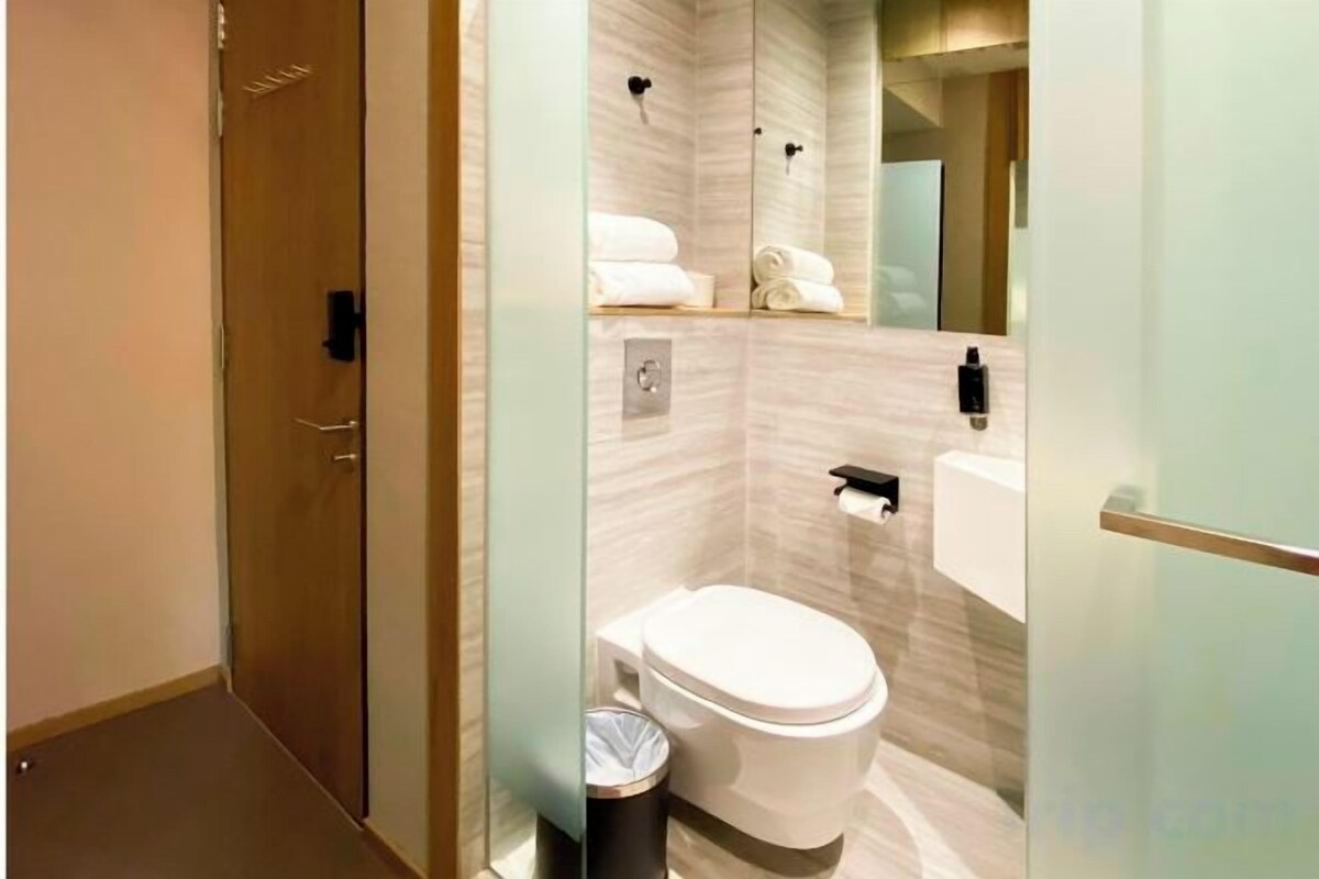 Bathroom | Shower, rainfall showerhead, hair dryer, bidet