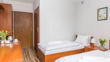 Desk, laptop workspace, free WiFi, bed sheets