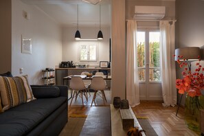 City Apartment | Living area | 43-inch Smart TV with cable channels, TV - Athens City the Nest of Filoxenia (Athens)