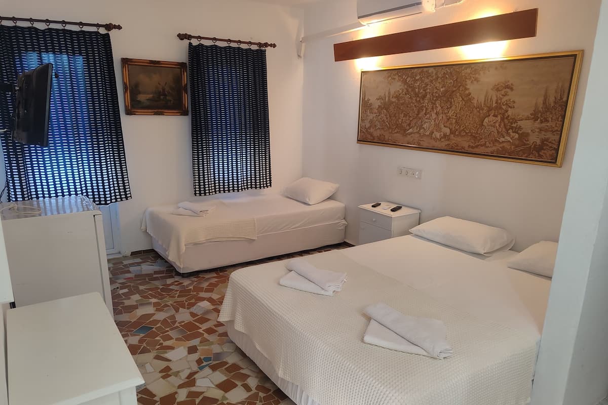 Chambre Familiale avec lits jumeaux