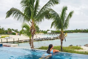 A heated pool - Sea Glass Found•Heated Pool•Private Beaches•Boats Included•5 Cottages•20 Acres (Man-O-War)