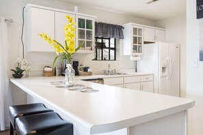 Condo, Multiple Beds, Balcony | Private kitchen | Fridge, microwave, oven, stovetop