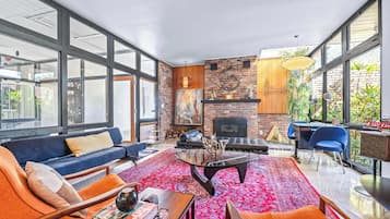 House, Multiple Beds, Fireplace, Garden View (Mid Century Modern Experience) | Living area | 42-inch flat-screen TV with digital channels