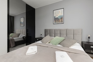 Apartment, 2 Bedrooms, Balcony | 2 bedrooms, desk, bed sheets