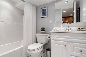 Bathtub, hair dryer, towels