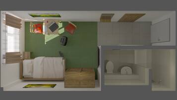 A room with a bed, a desk, a chair, a small table, and a cabinet.