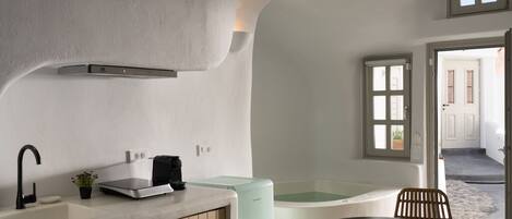 Fridge, coffee/tea maker, electric kettle, cookware/dishes/utensils