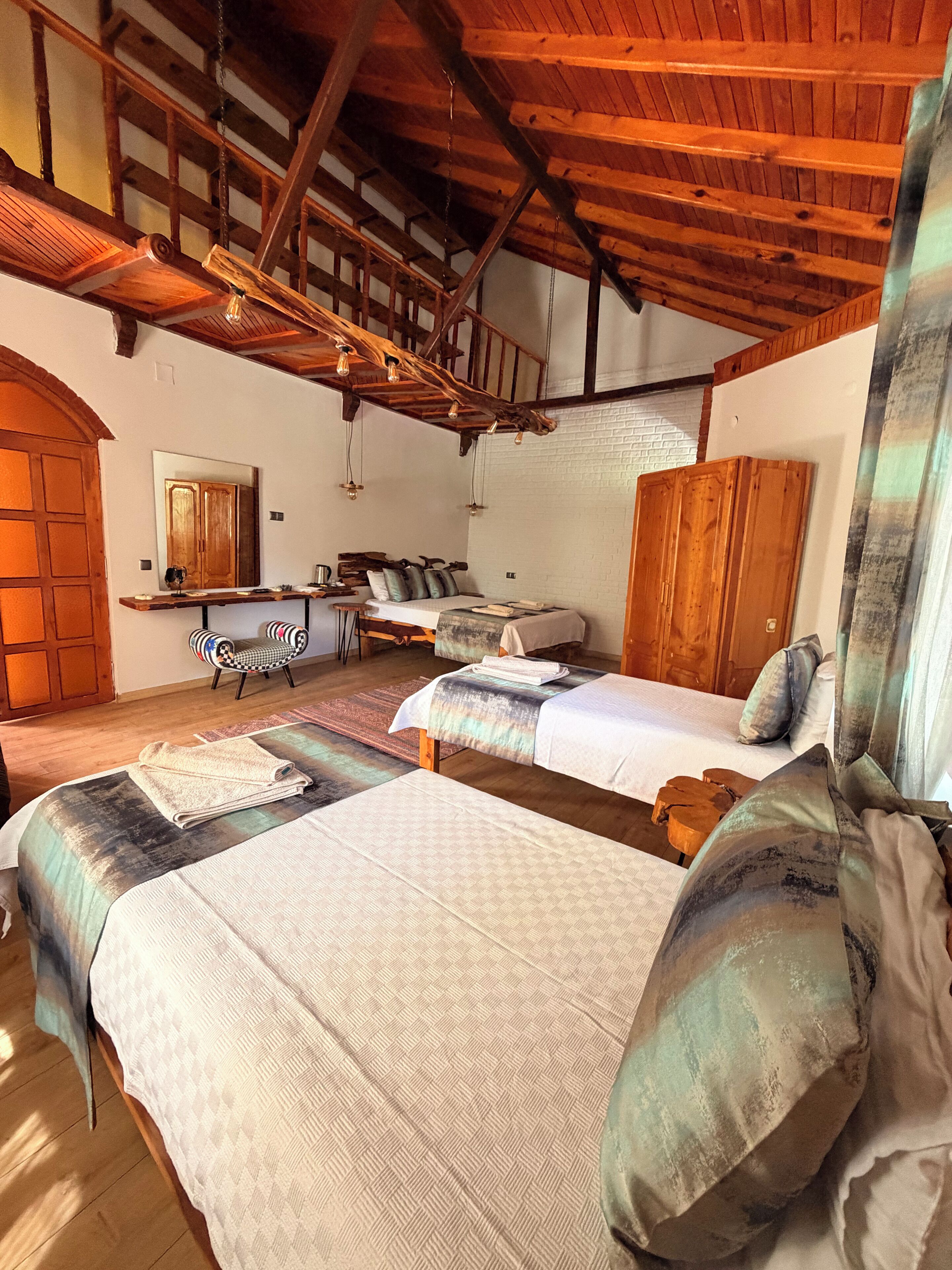 Elite Quadruple Room, 1 Bedroom, Smoking, Mountain View | Laptop workspace, iron/ironing board, free WiFi