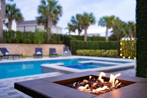 Outdoor pool, a heated pool - Epic Themes | Pool/Hot Tub | Theater & Game Room (Reunion)