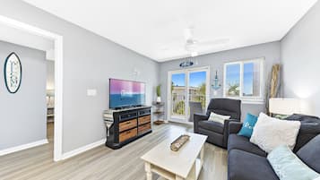 Signature Condo, 2 Bedrooms, Beach View | Living room | 50-inch Smart TV with cable channels, TV