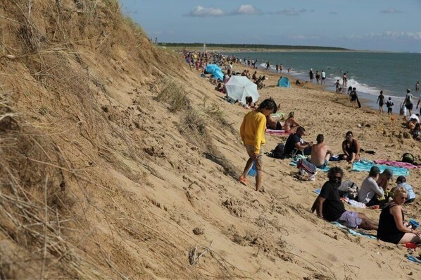 Guests can enjoy a scenic beach experience with access to the water.