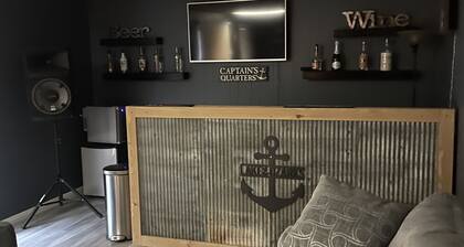 Waterfront lake home, dock, quiet swim cove next to The Cave Restaurant + many