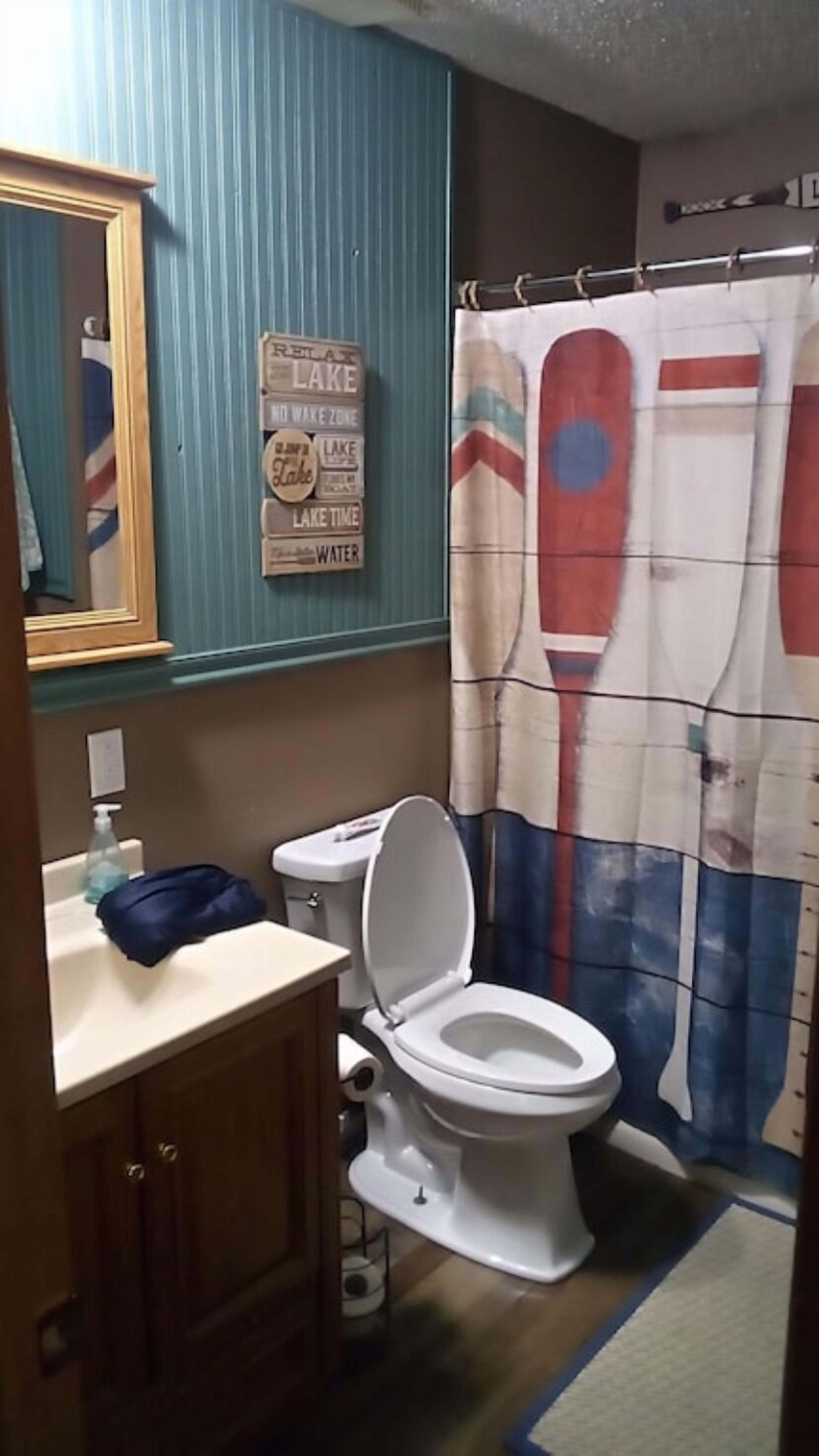 Waterfront lake home, dock, quiet swim cove next to The Cave Restaurant + many