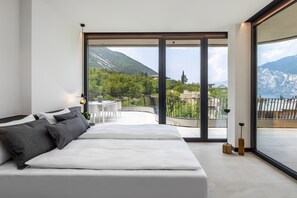 Family Suite, Terrace, Lake View | Minibar, in-room safe, desk, laptop workspace