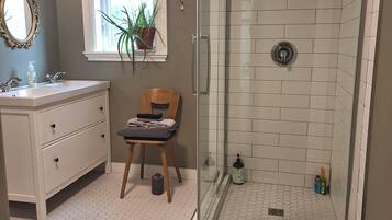 Bathtub, eco-friendly toiletries, hair dryer, towels