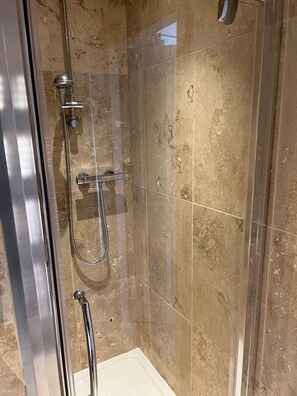 Shower, hair dryer, towels
