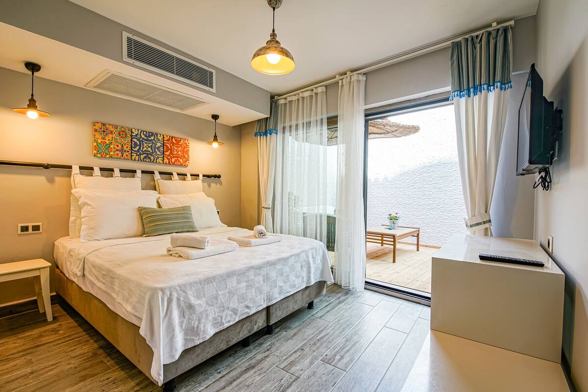 Chambre Deluxe, patio | 1 chambre, draps fournis