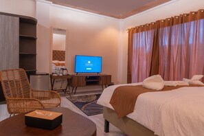 Premium bedding, down comforters, memory foam beds, minibar