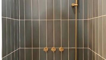 Shower, eco-friendly toiletries, hair dryer, towels