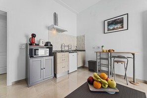 Microwave, stovetop, coffee/tea maker, high chair