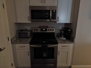 Microwave, oven, stovetop, dishwasher - Newer Construction Condo - Surfside Beach, SC (Myrtle Beach)