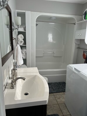 Hair dryer, towels, soap, shampoo