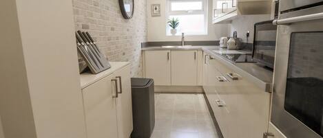 Fridge, dishwasher, electric kettle, toaster