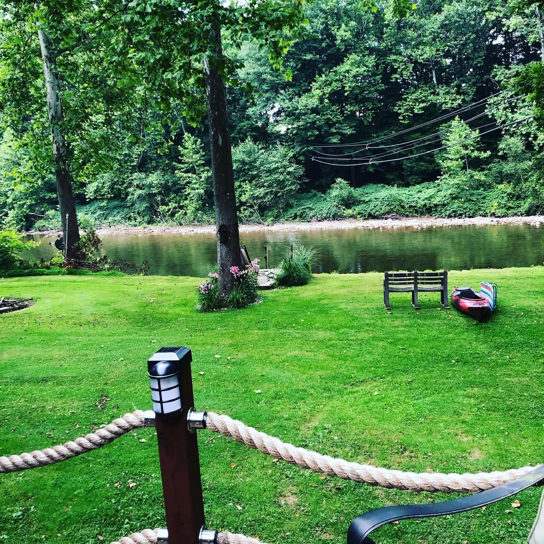 Creekfront getaway with hot tub and fire pit.