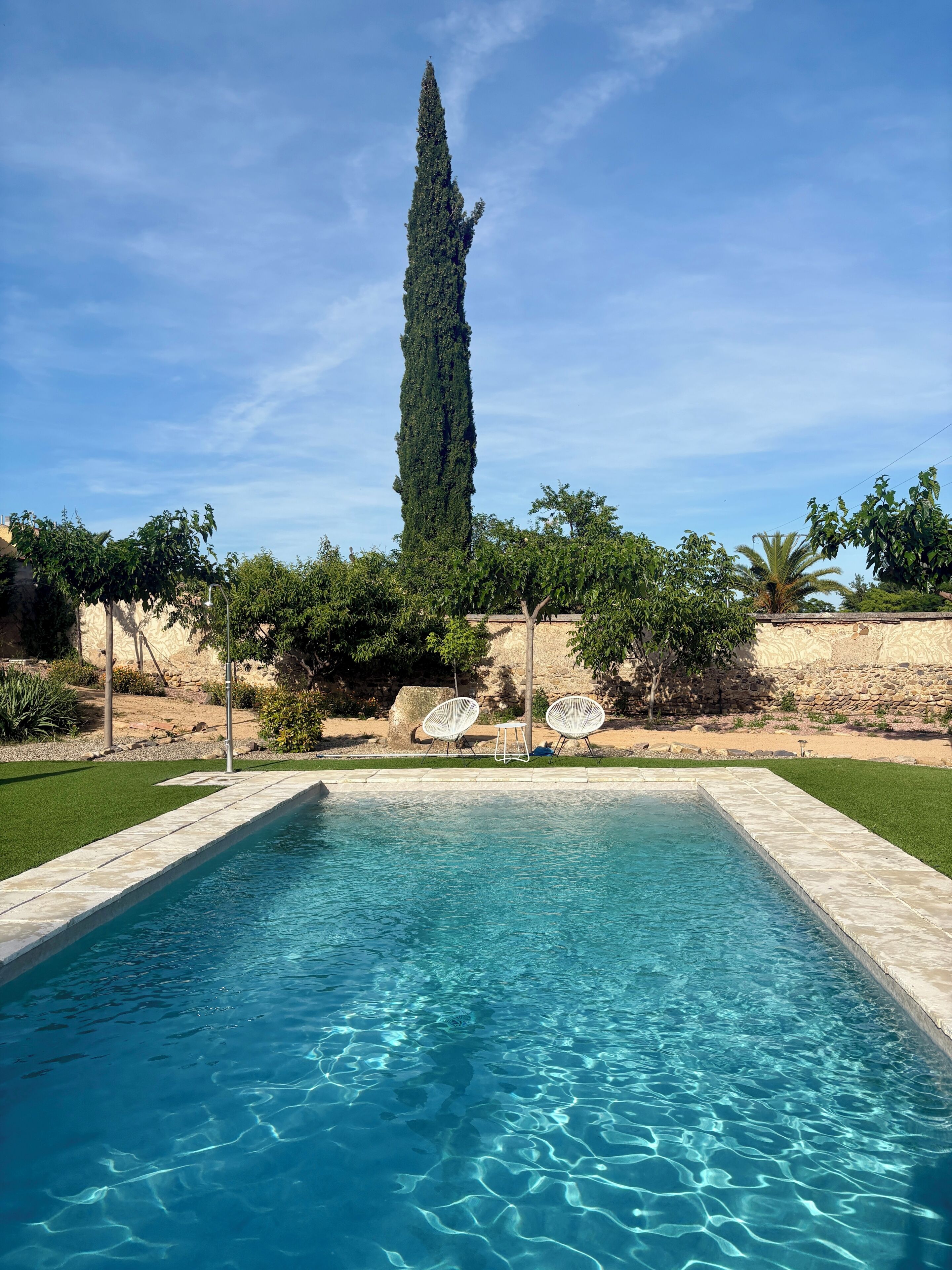 Seasonal outdoor pool, open 11:00 AM to 8:30 PM, pool umbrellas