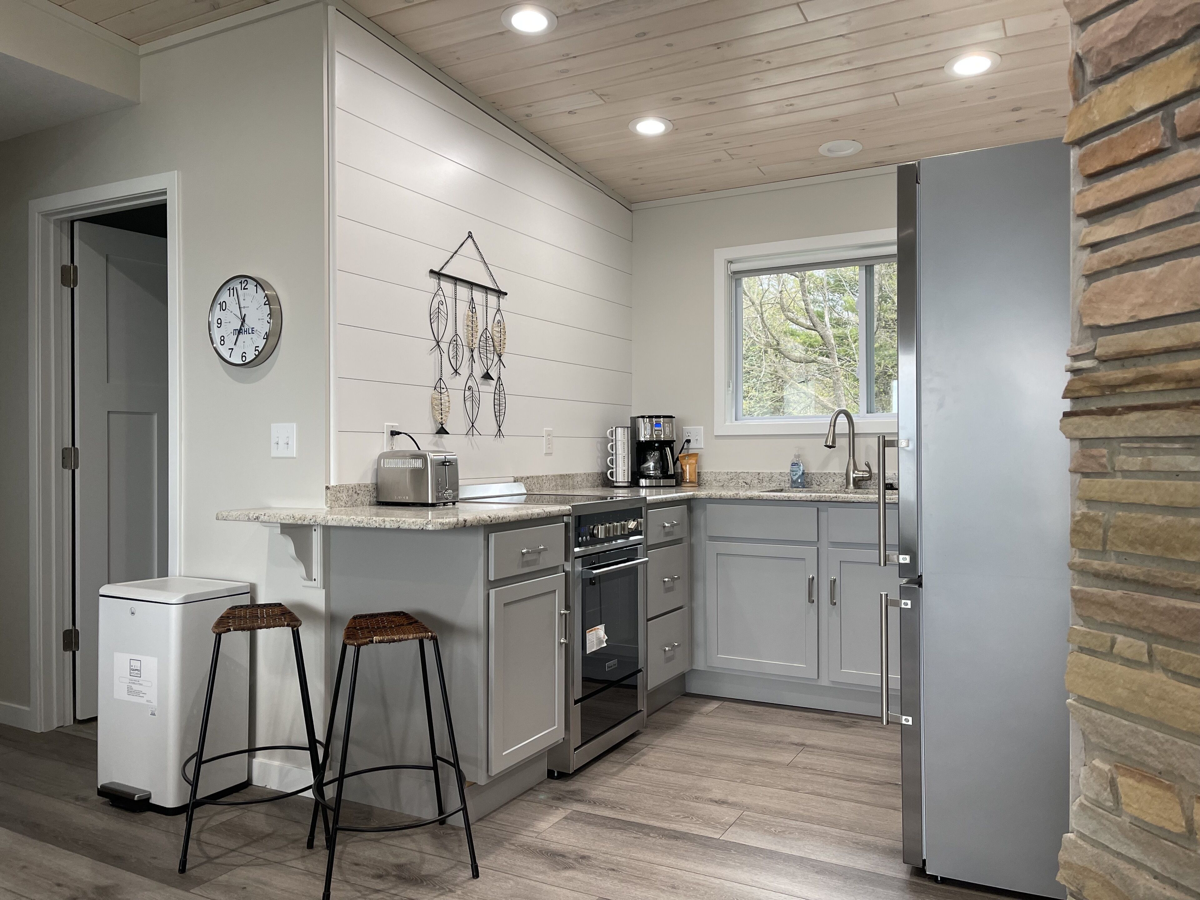 Perfect location on East Twin Lake, walking distance to town! Unit #1