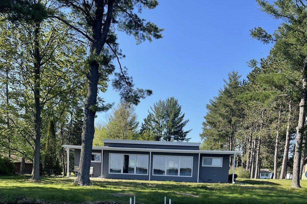 Perfect location on East Twin Lake, walking distance to town! Unit #1