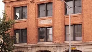 A brick building with a sign reading "EXCHANGE" on the front.