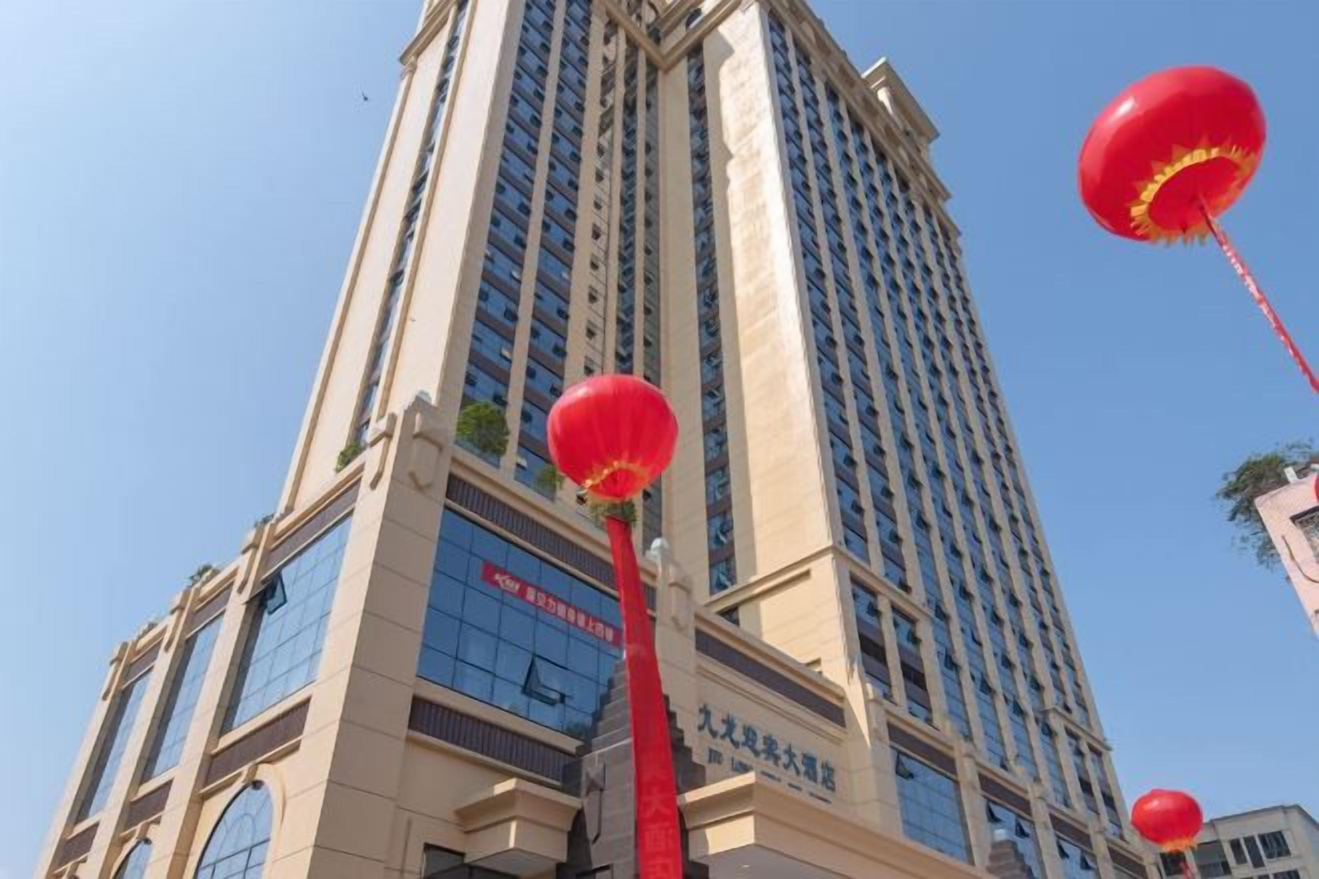 A tall building with multiple floors and a clear sky.