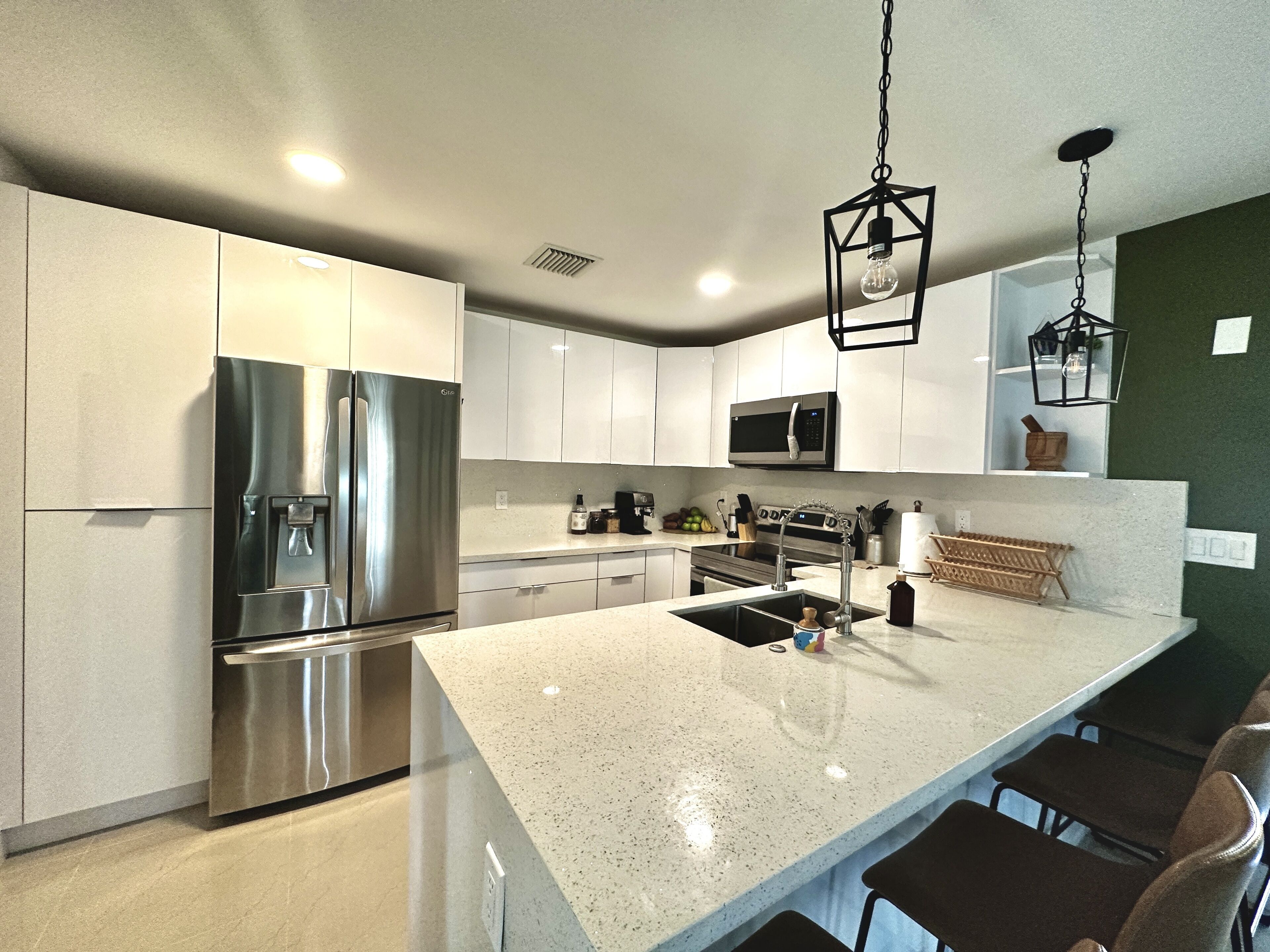 Remodeled home in a quiet central neighborhood near beaches & shopping centers.