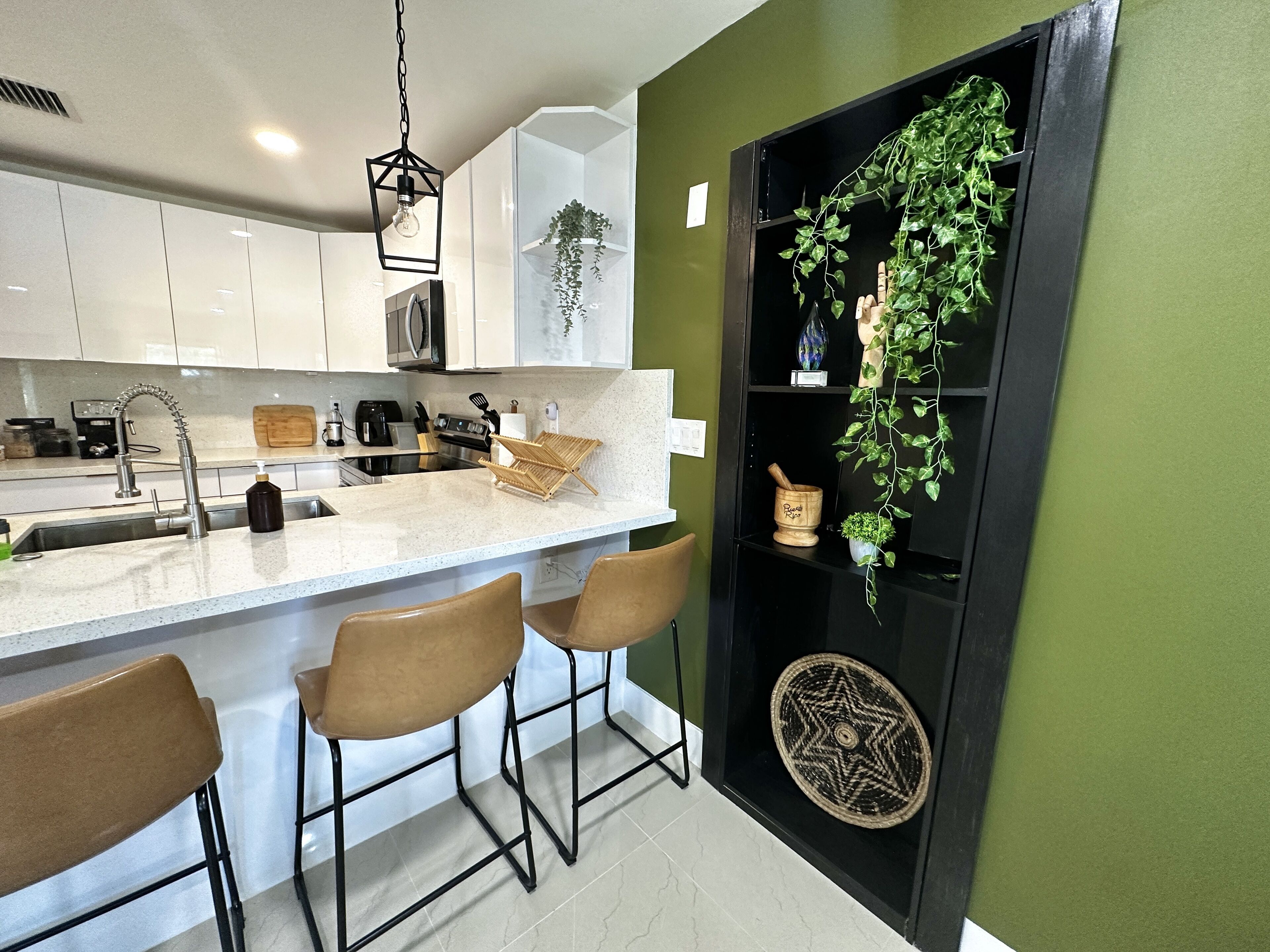 Remodeled home in a quiet central neighborhood near beaches & shopping centers.