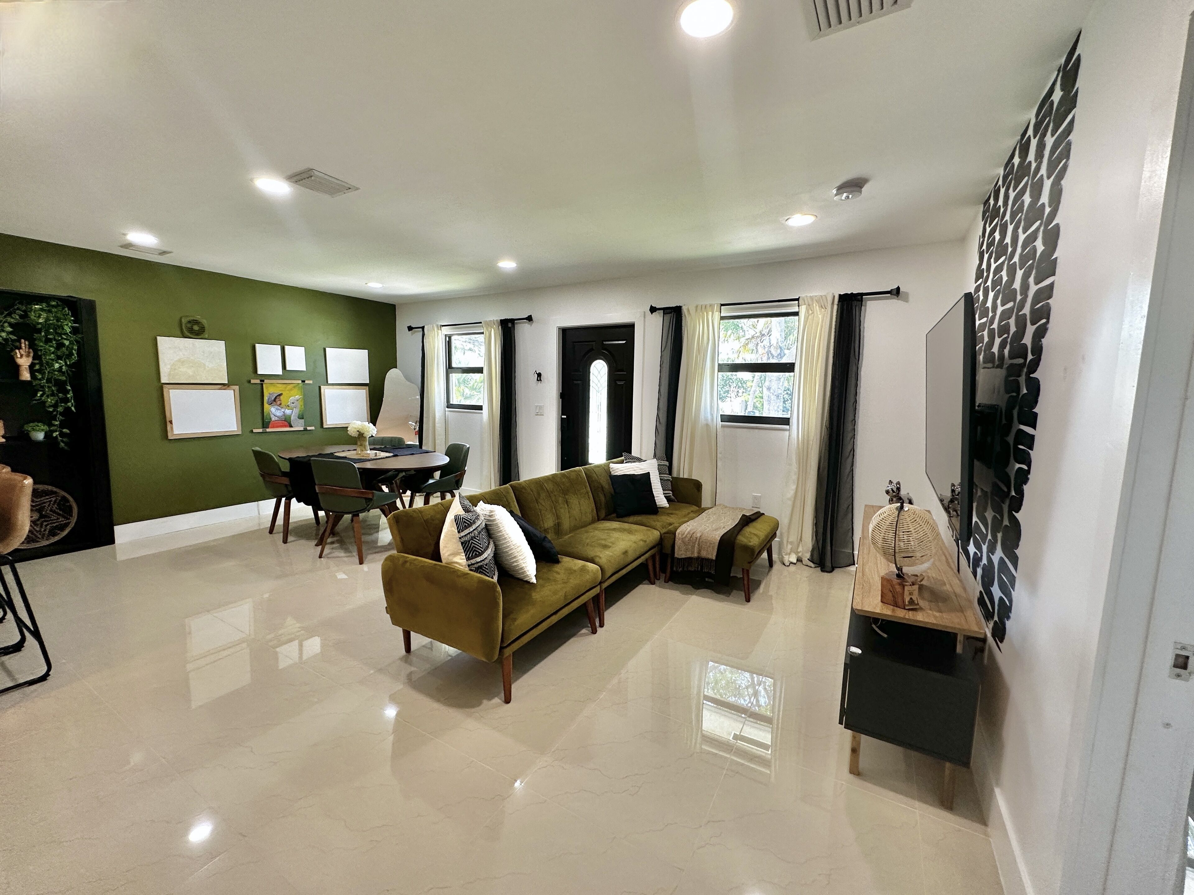 Remodeled home in a quiet central neighborhood near beaches & shopping centers.