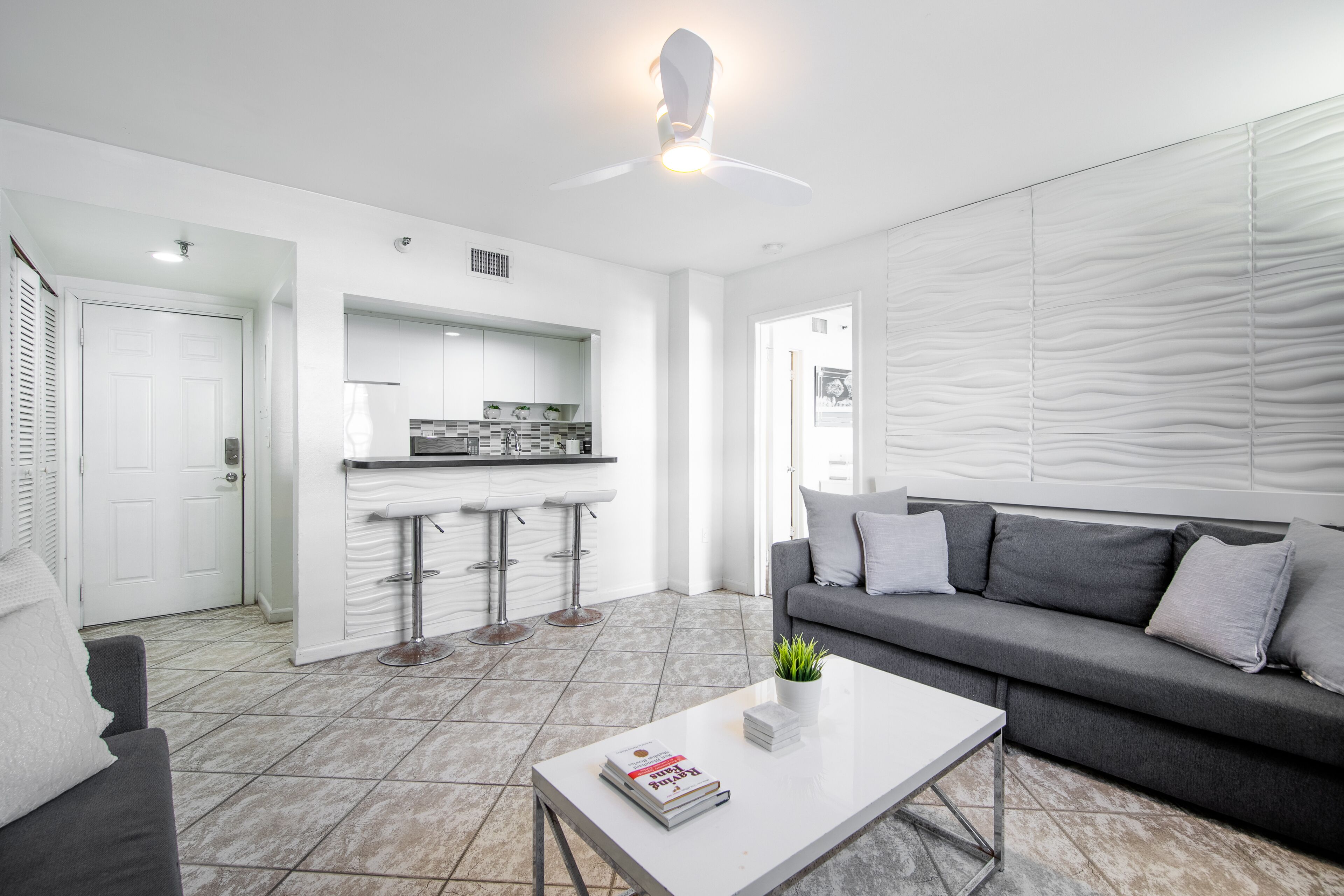 Chic condo with full kitchen & WiFi steps from beach, shopping, & dining